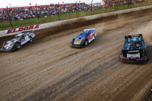 Gustin battles in his Heat Race