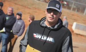 Stewart Friesen on his way back from signing in