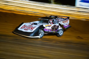 Madden survives to finish second
