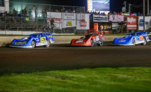 Mike Marlar, Tyler Bruening, and Dennis Erb Jr. battle at Boone Speedway