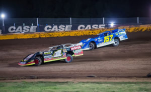 Brent Larson dives under Mike Marlar