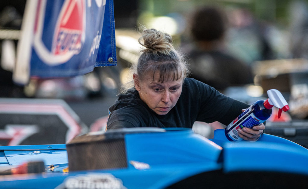 Heather Lyne prepares Dennis Erb Jr.'s car