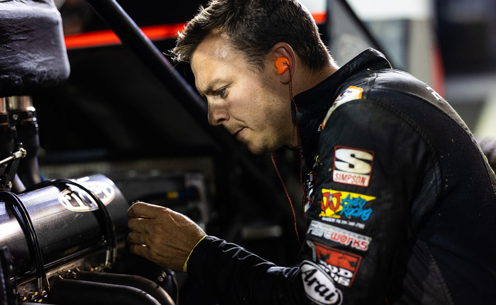 Kyle Reinhardt works on his engine