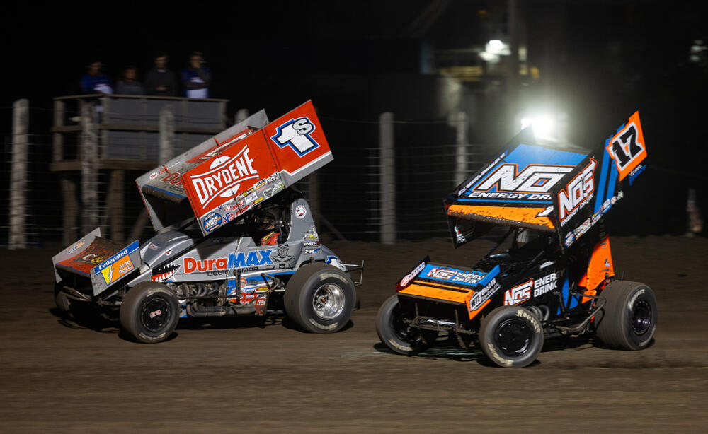 Logan Schuchart drives by Sheldon Haudenschild