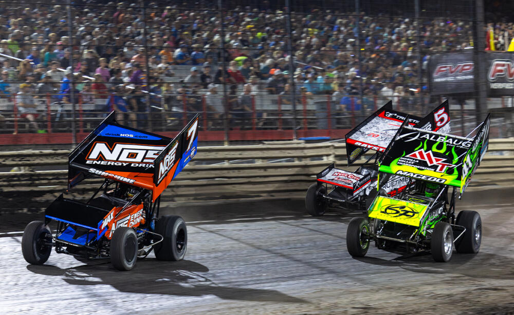 Carson Macedo looks to Anthony Macri's inside for the lead