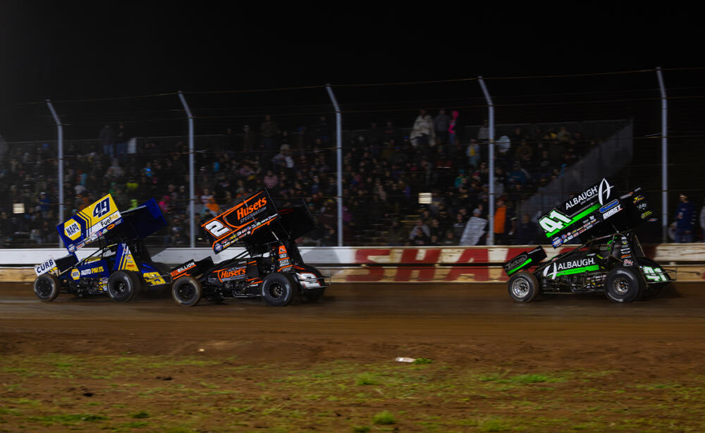 Brad Sweet races ahead of David Gravel and Carson Macedo at Sharon Speedway.