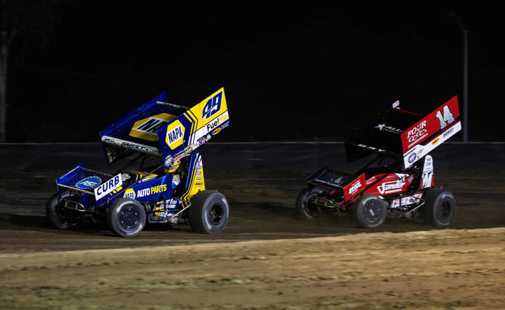 Brad Sweet races ahead of Corey Day at Kings Speedway