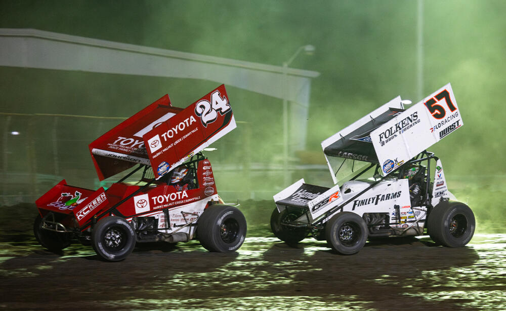 Chase Johnson races just ahead of Kyle Larson