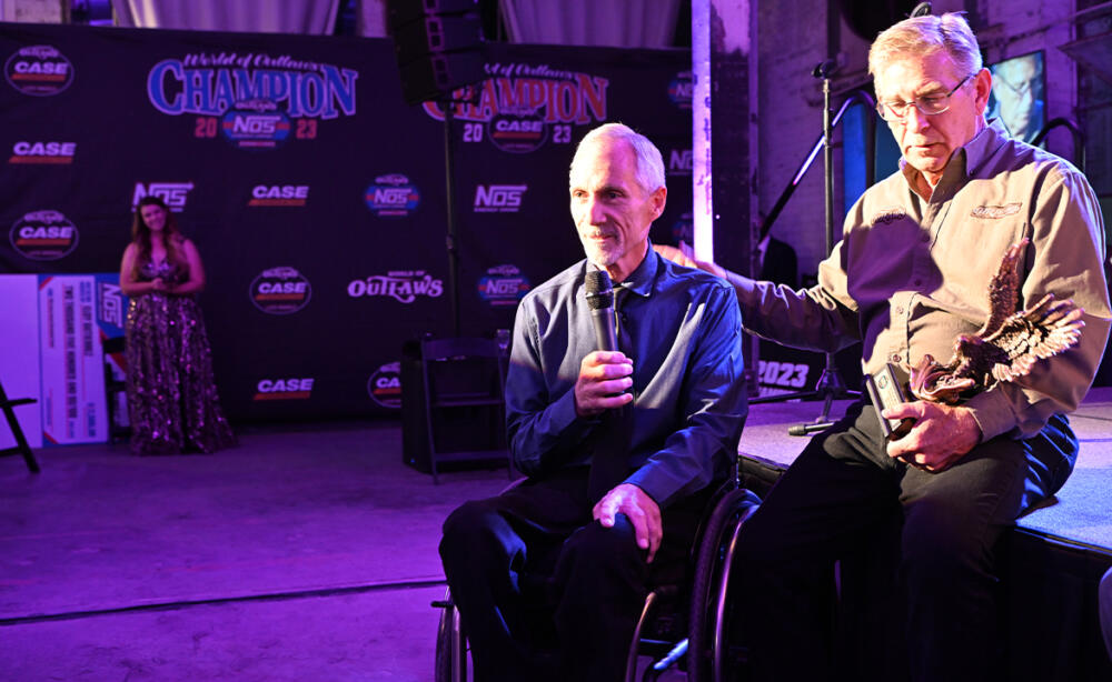 Brad Doty speaks following being awarded the Ted Johnson Award