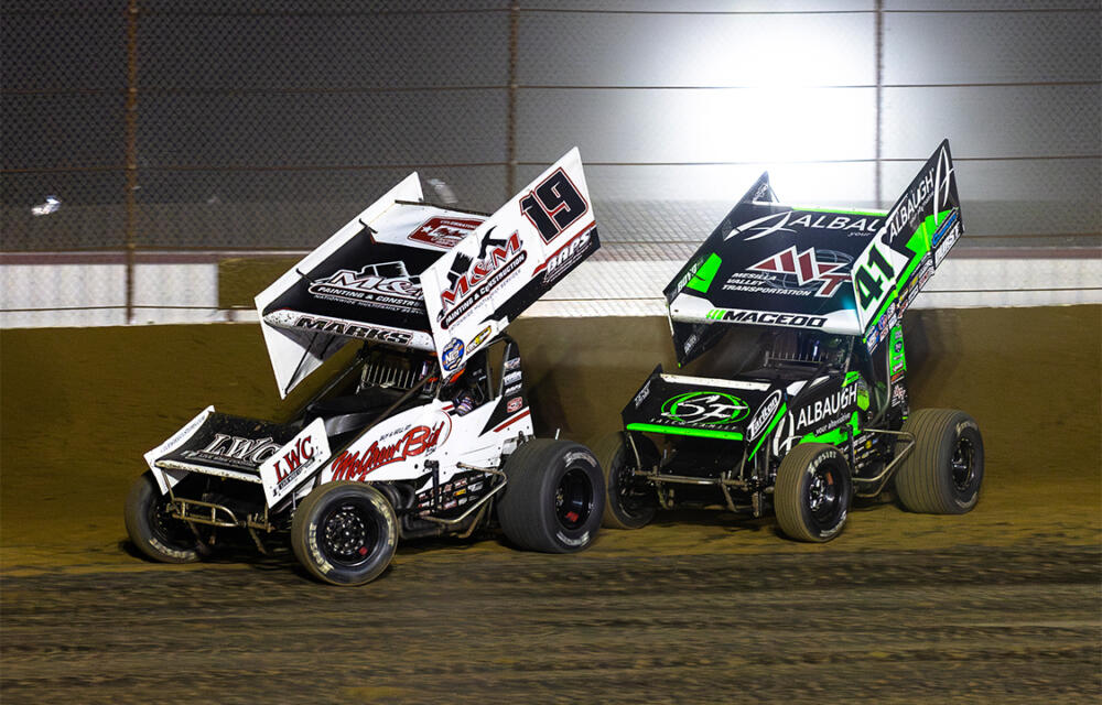 Brent Marks slides ahead of Carson Macedo