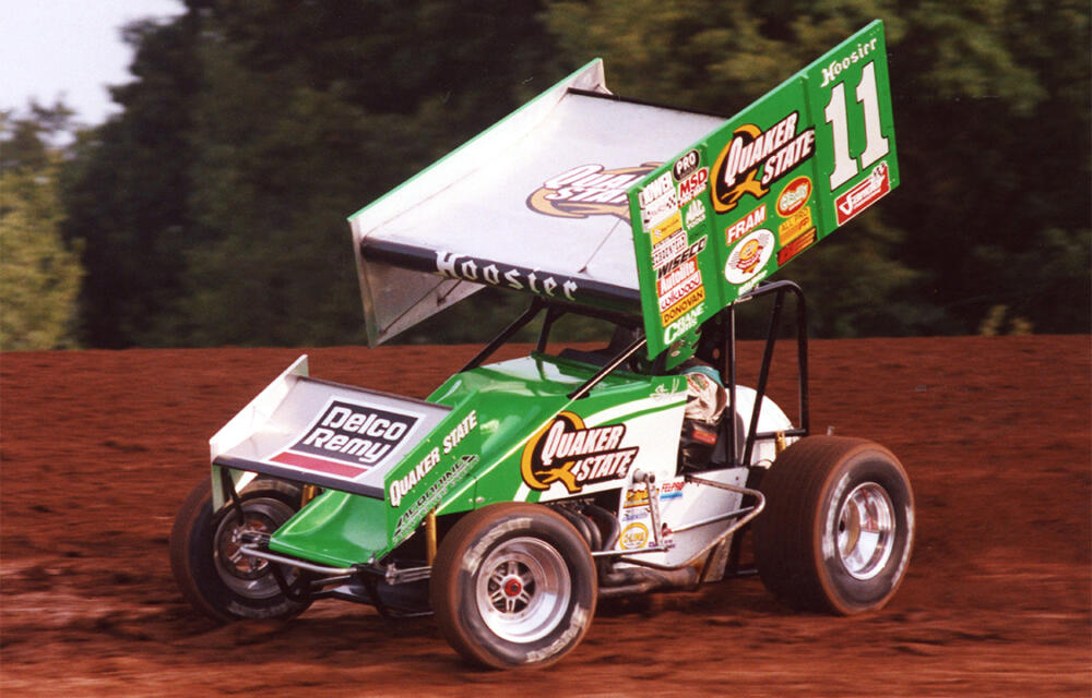 Steve Kinser driving the Quaker State #11