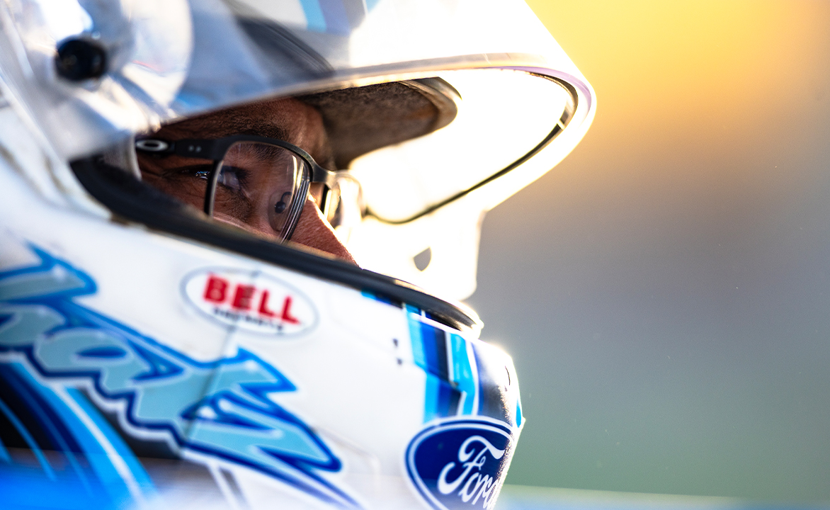 Donny Schatz sits in the Tony Stewart/Curb Agajanian Racing #15 with his helmet on and visor up