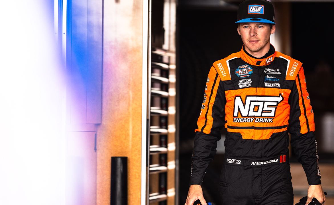 Sheldon Haudenschild walking out of the Stenhouse Jr.-Marshall Racing hauler