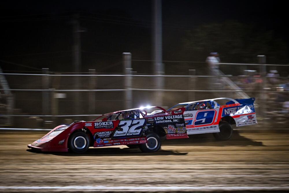 Bobby Pierce passes Nick Hoffman on the inside line for the lead.