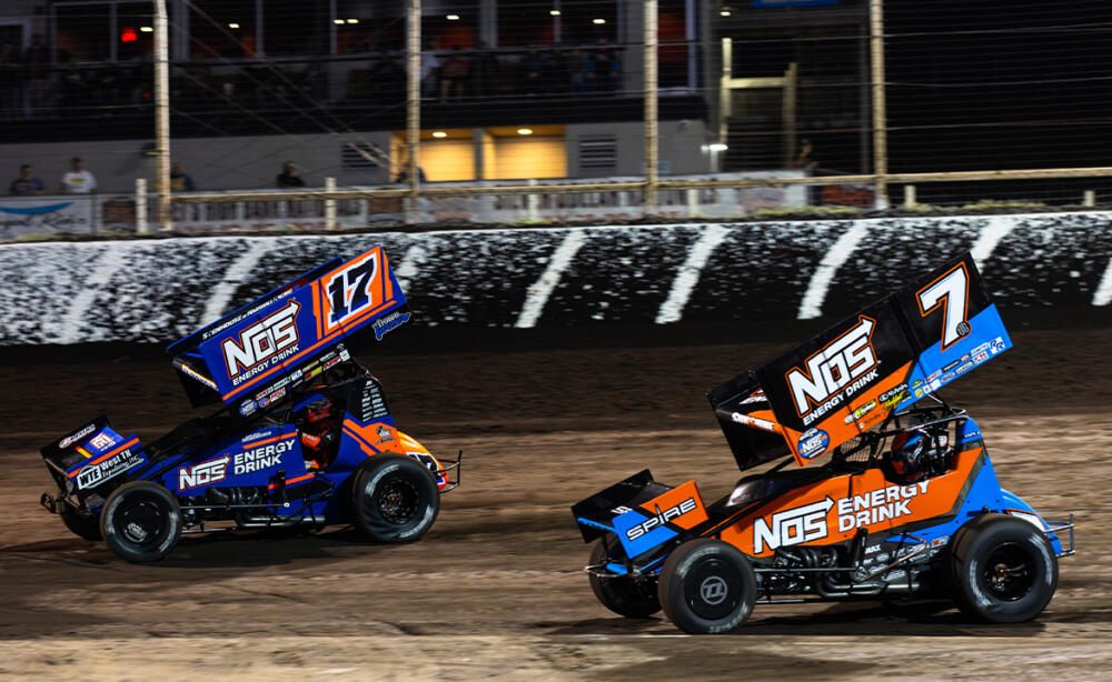 Sheldon Haudenschild races ahead of Tyler Courtney at Huset's