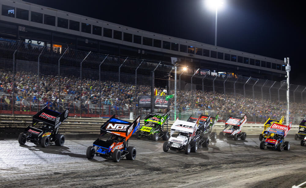 A pack of Sprint Cars take the green flag at Knoxville Raceway