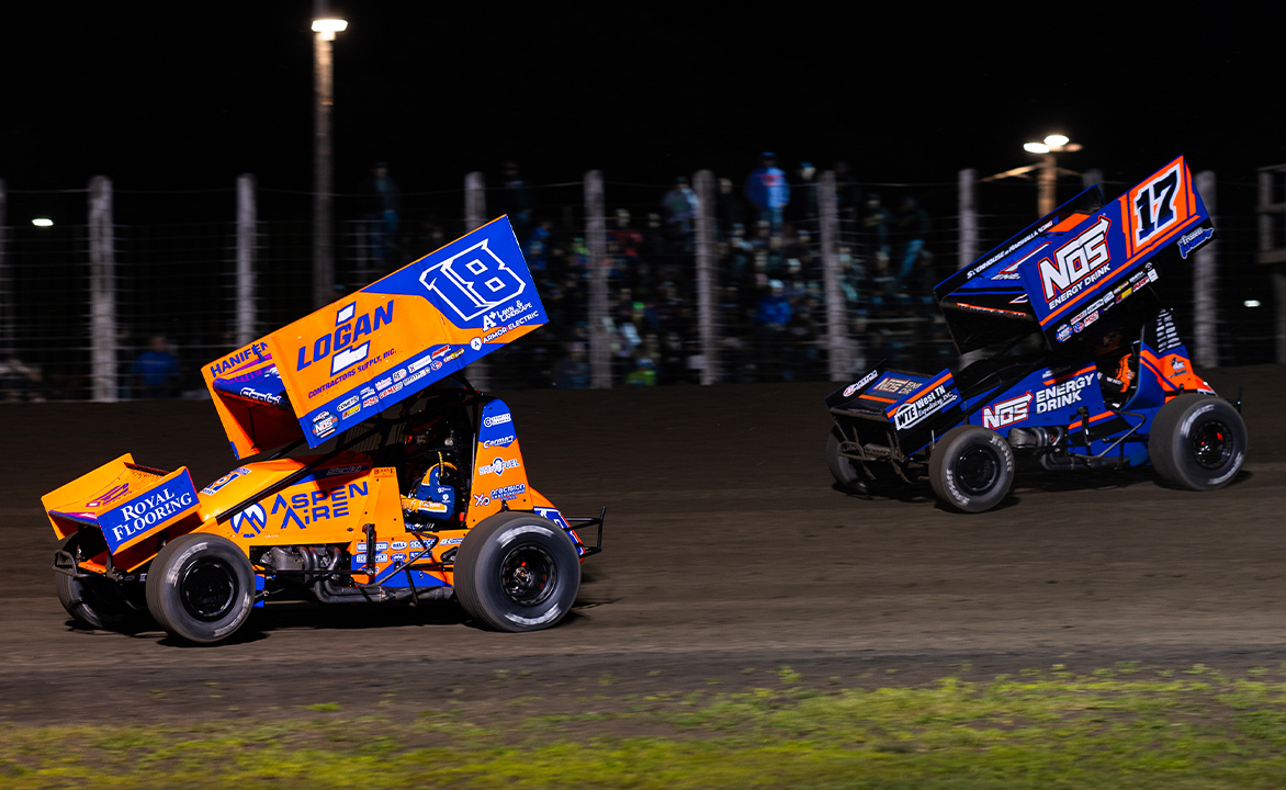Gio Scelzi races ahead of Sheldon Haudenschild at River Cities Speedway