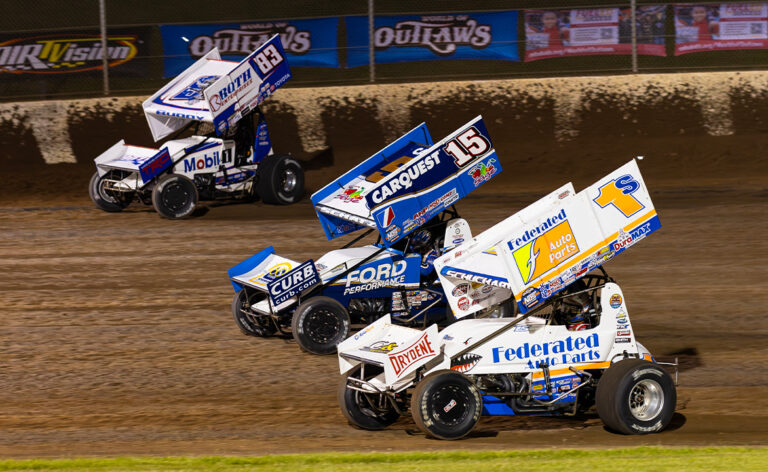 Logan Schuchart, Donny Schatz, and Buddy Kofoid race three-wide