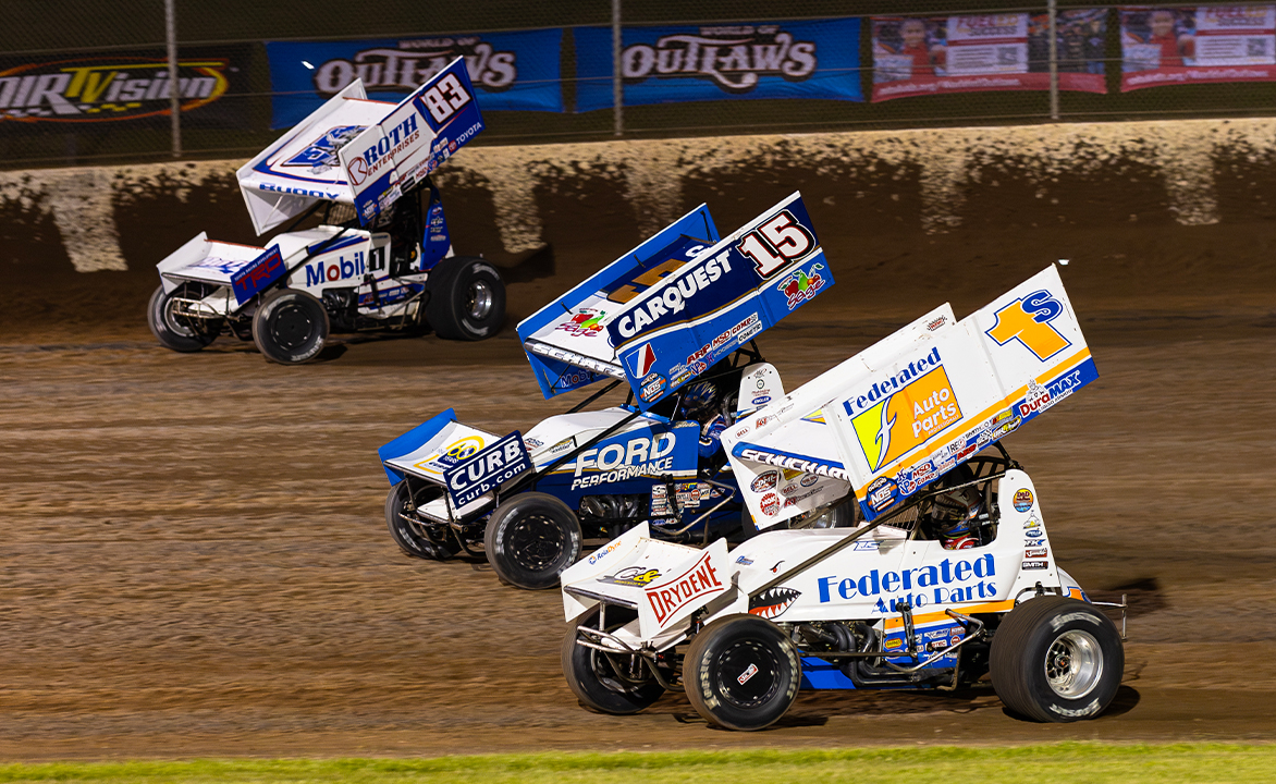 Logan Schuchart, Donny Schatz, and Buddy Kofoid race three-wide