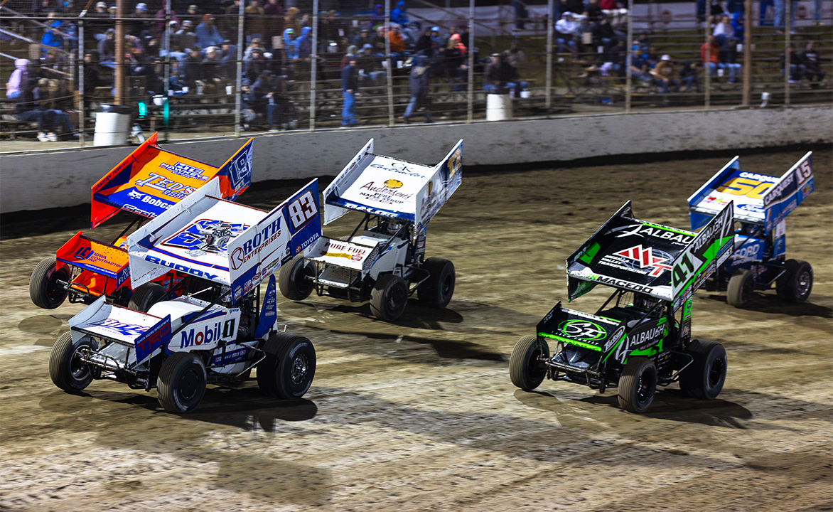 The World of Outlaws NOS Energy Drink Sprint Cars take the green flag on a Toyota Dash at I-55