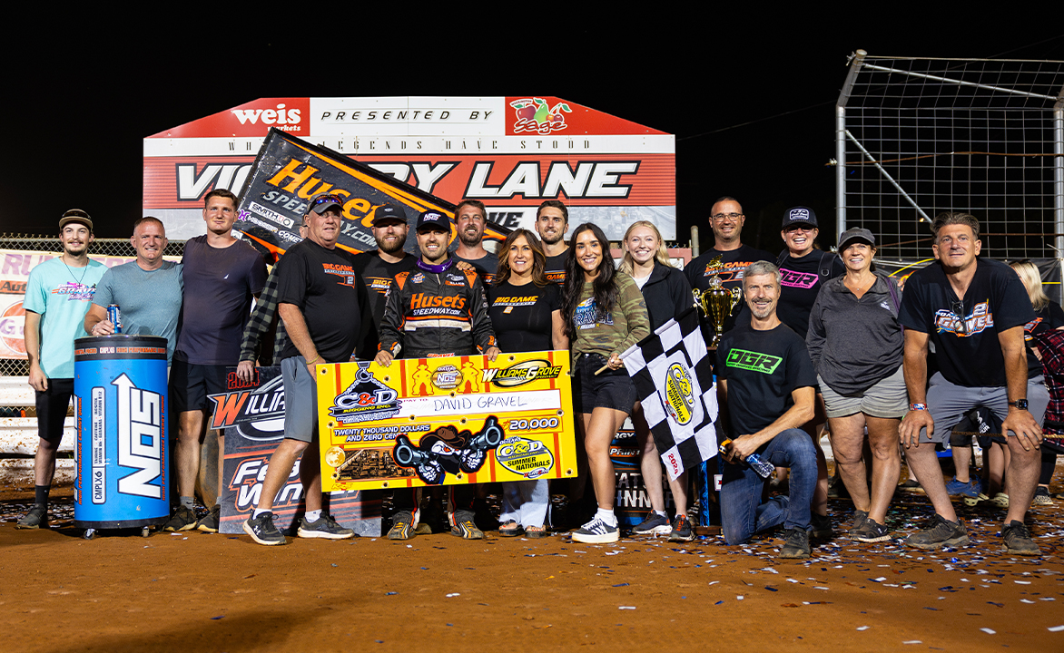 David Gravel and his team and family pose for a photo in Williams Grove Victory Lane