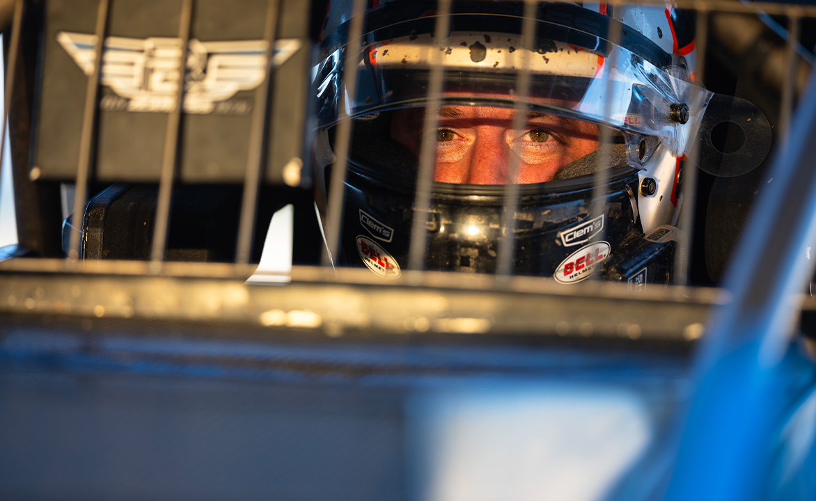 Brock Zearfoss sits in his Sprint Car with his helment on.