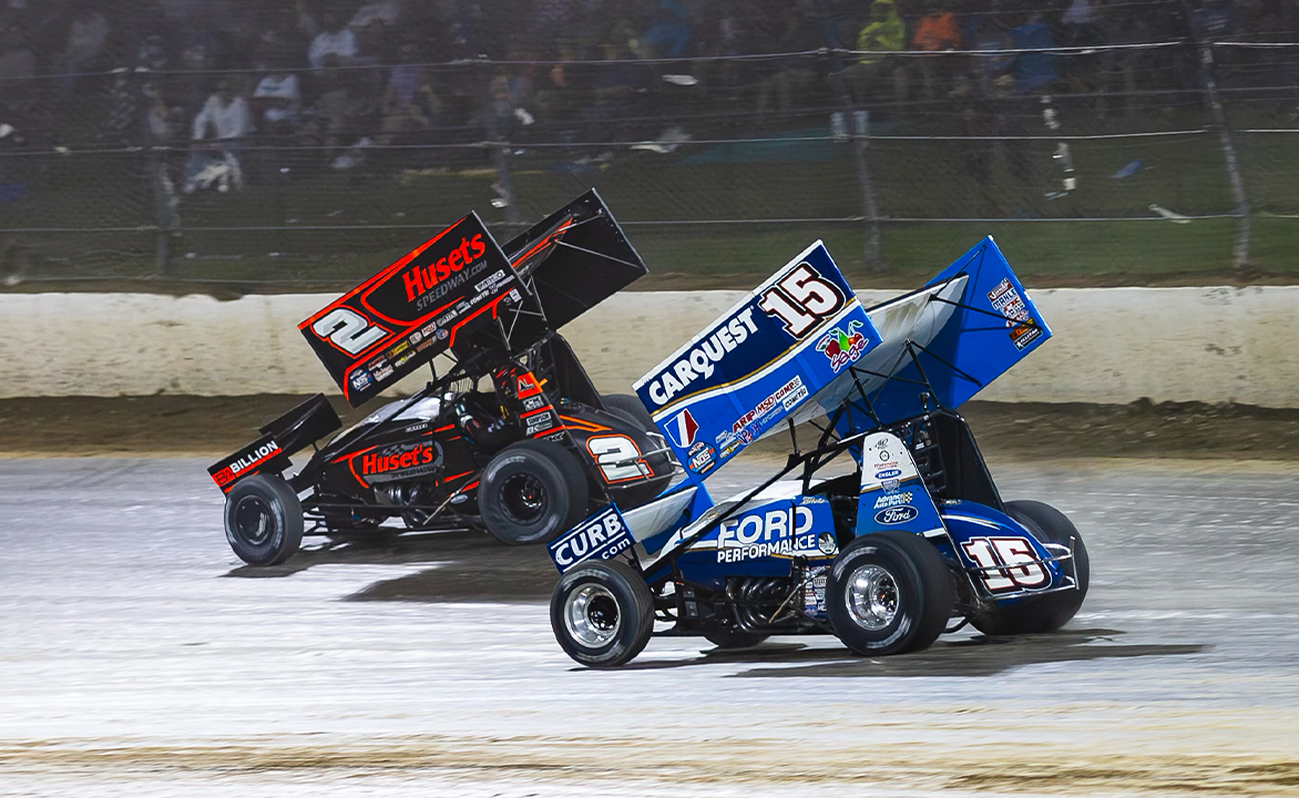 David Gravel racing just ahead of Donny Schatz at Eldora