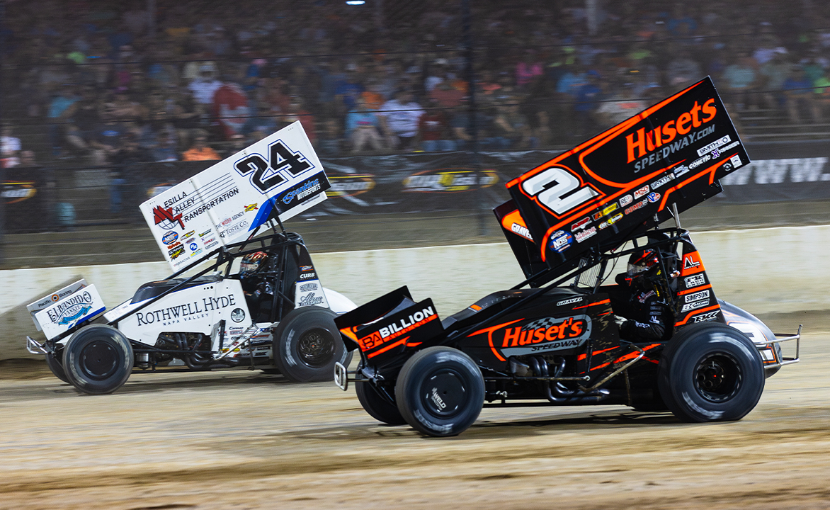 Rico Abreu racing side by side with David Gravel at Eldora Speedway