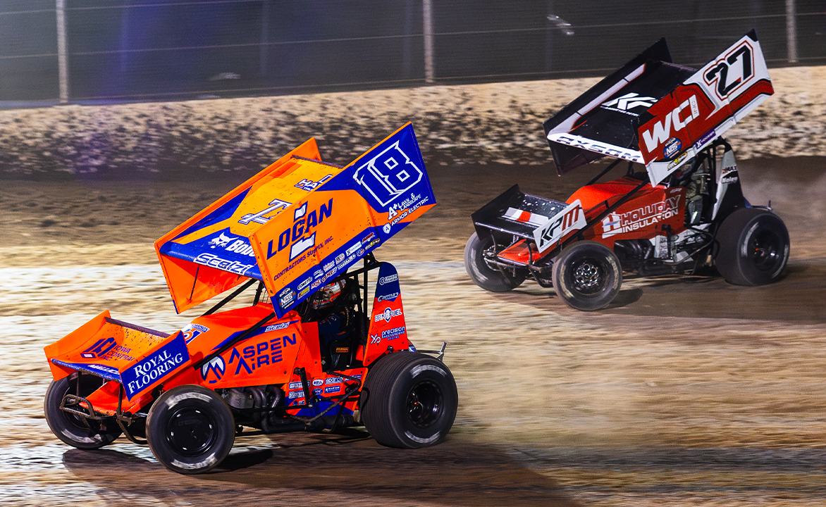 Giovanni Scelzi drives under Emerson Axsom to take the lead at Beaver Dam Raceway