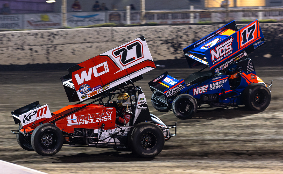 Emerson Axsom races with Sheldon Haudenschild at Huset's 