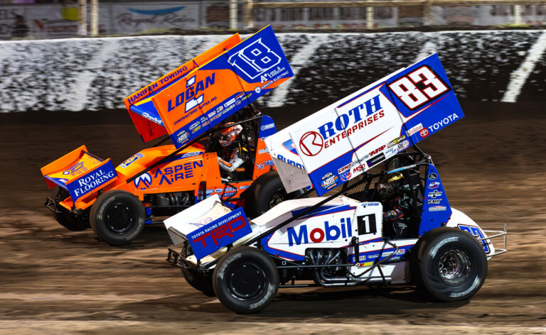 Buddy Kofoid races next to Giovanni Scelzi at Huset's Speedway