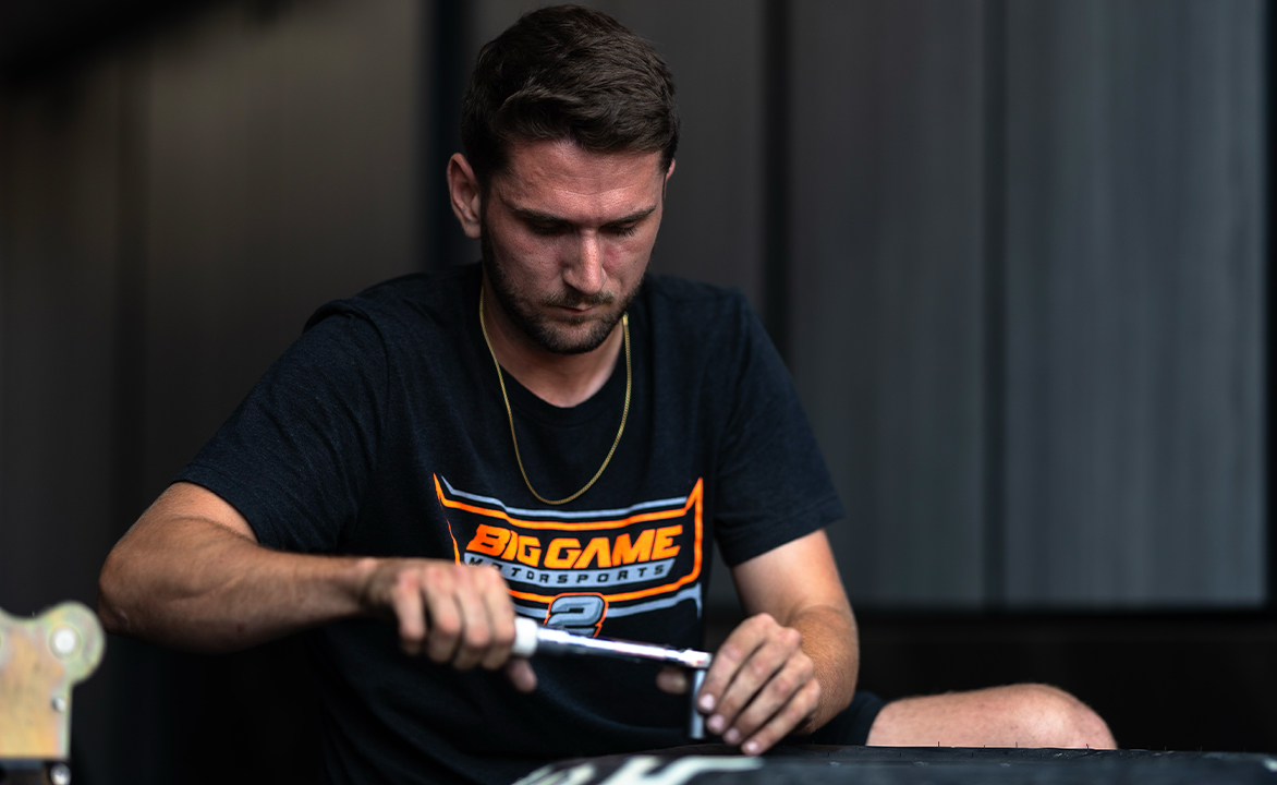 Zach Patterson working in the Big Game Motorsports hauler