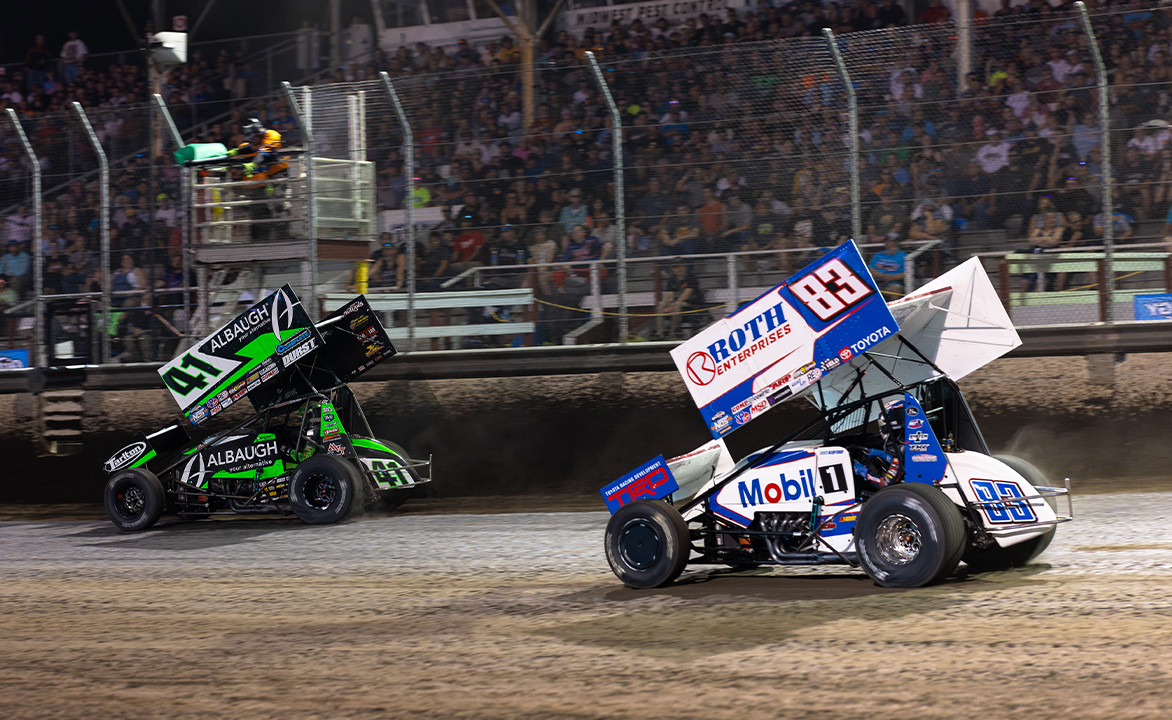 Carson Macedo races ahead of Buddy Kofoid at River Cities Speedway