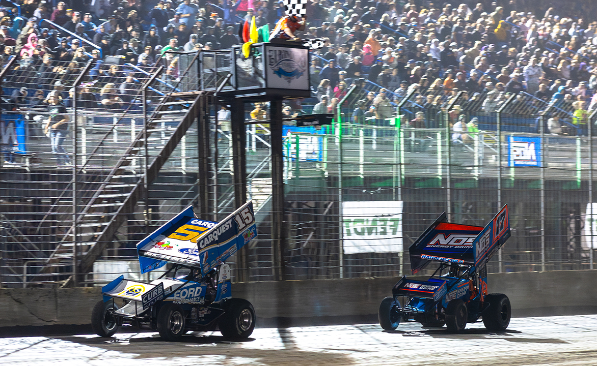 Donny Schatz takes the checkered flag at Jackson Motorplex with Sheldon Haudenschild just behind him