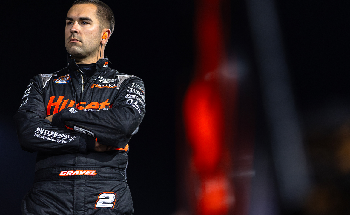 David Gravel stands in his fire suit at Knoxville Raceway