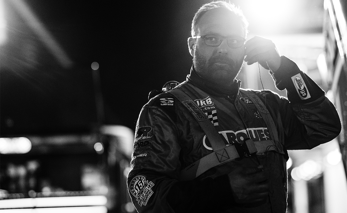 Donny Schatz standing next to the Tony Stewart/Curb Agajanian Racing No. 15 Sprint Car