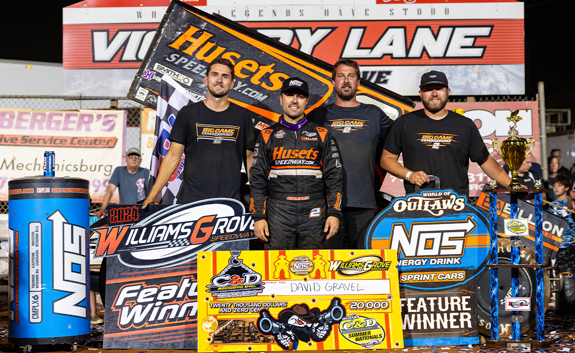 David Gravel and the Big Game Motorsports team stand in Williams Grove Victory Lane