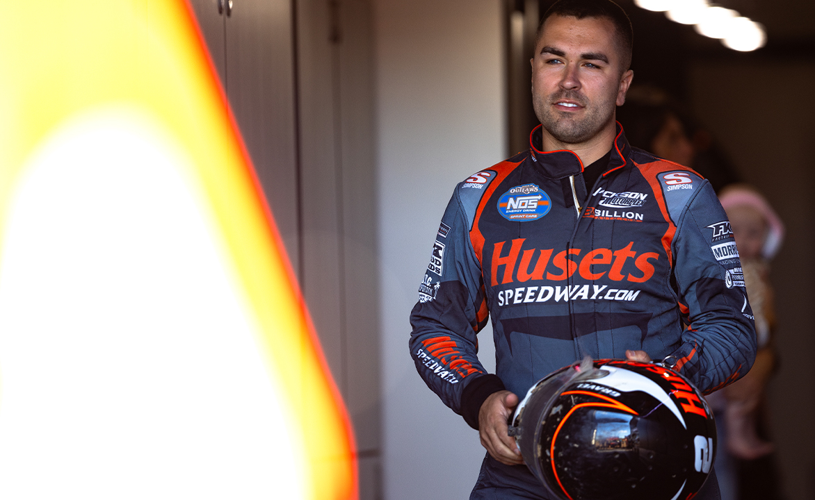 David Gravel stands in the Big Game Motorsports trailer