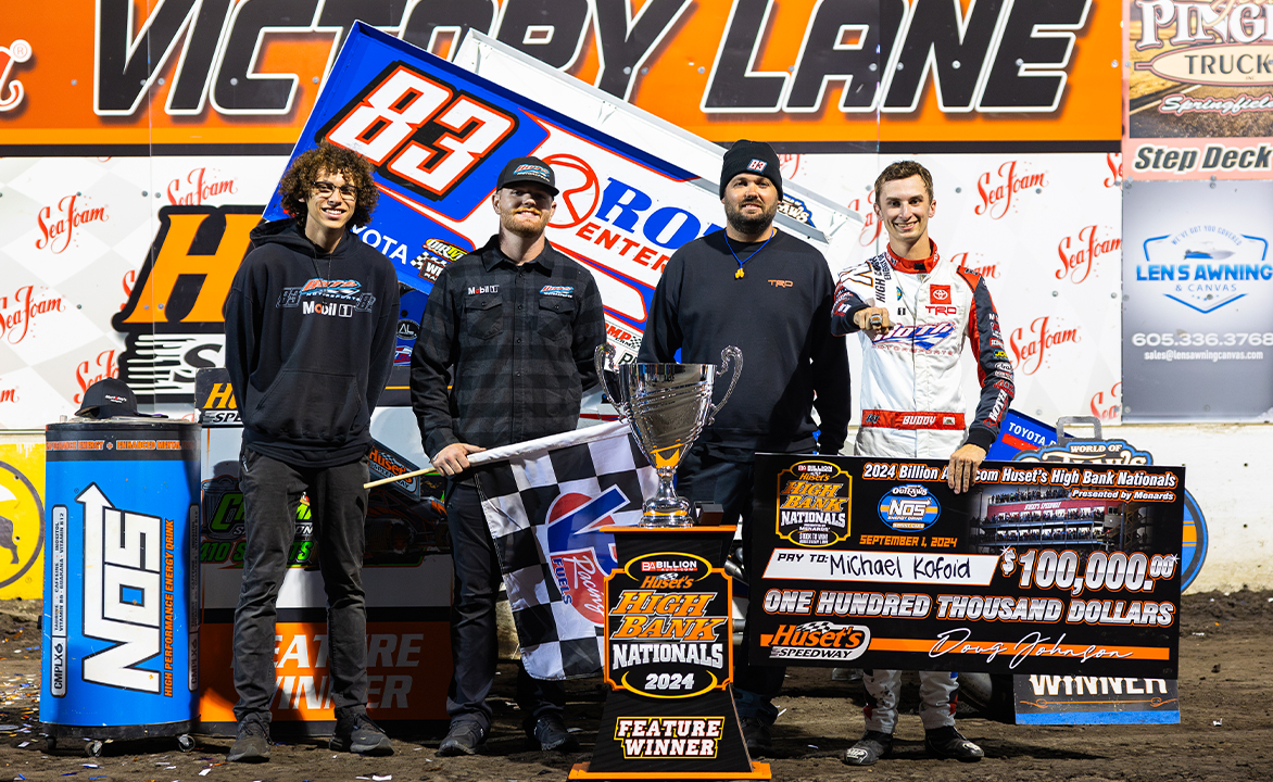 The Roth Motorsports team stands in Victory Lane after winning Huset's