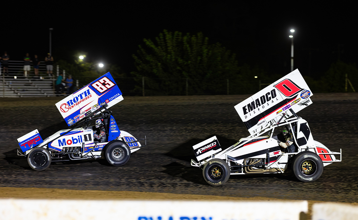 Buddy Kofoid races ahead of Tim Kaeding at Merced Speedway