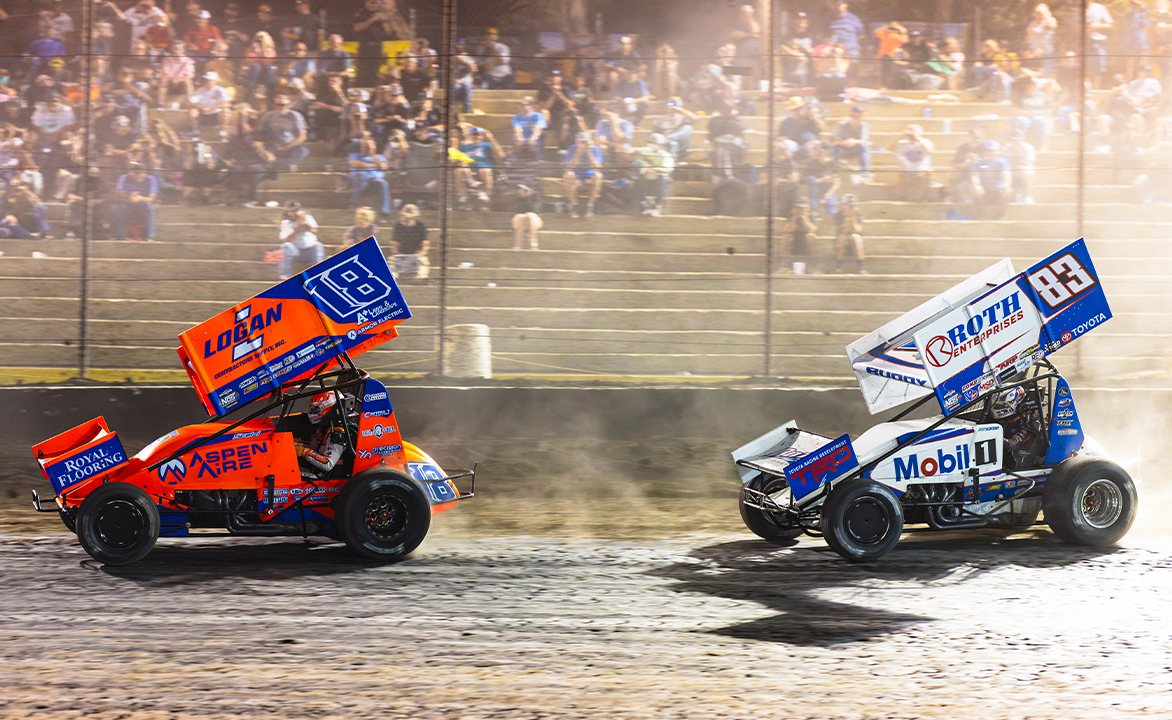 Gio Scelzi races ahead of Buddy Kofoid at Bakersfield