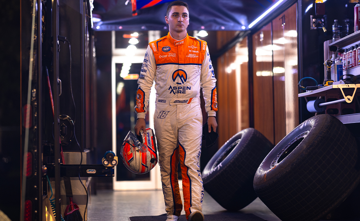 Gio Scelzi walking out of the KCP Racing hauler