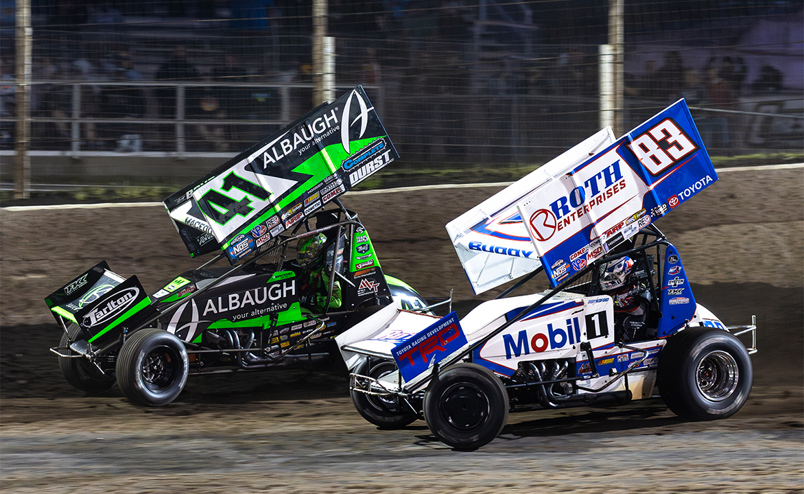 Carson Macedo and Buddy Kofoid race to the checkered flag at Huset's