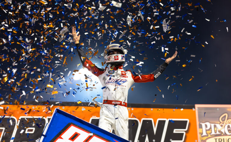 Buddy Kofoid celebrates with a wing dance at Huset's Speedway