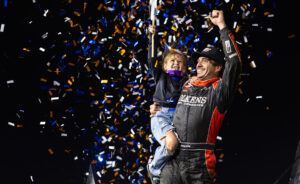 Aaron Reutzel celebrates at Dirt Oval 66