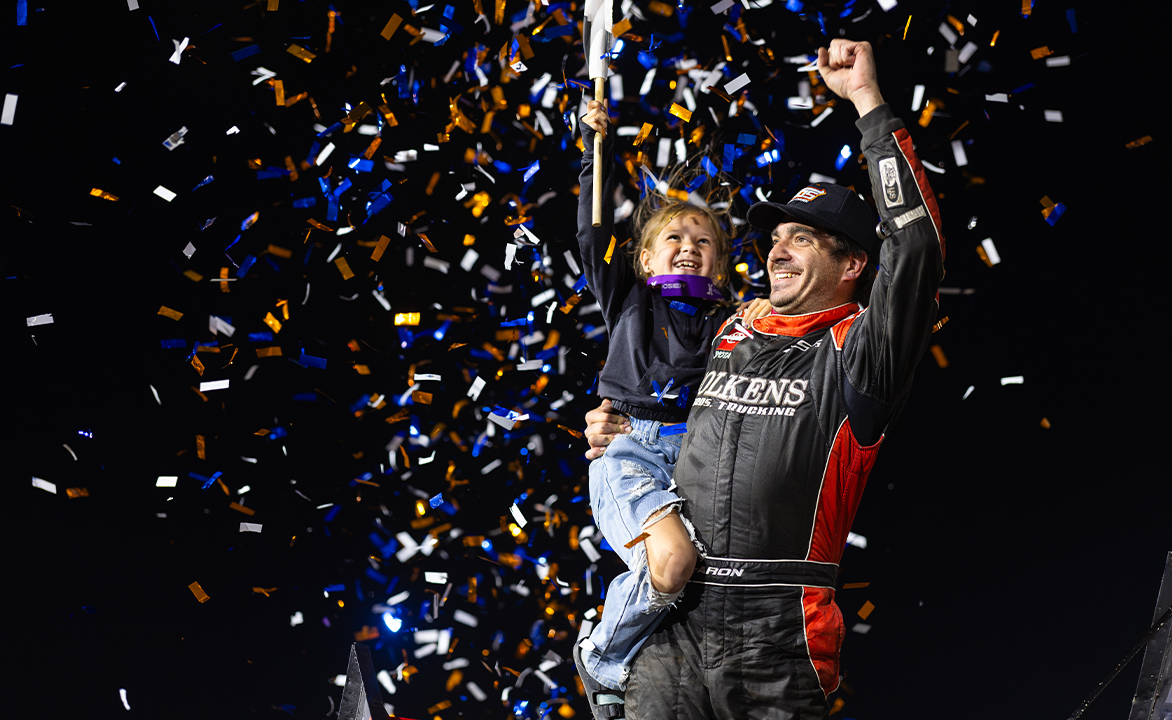 Aaron Reutzel celebrates at Dirt Oval 66