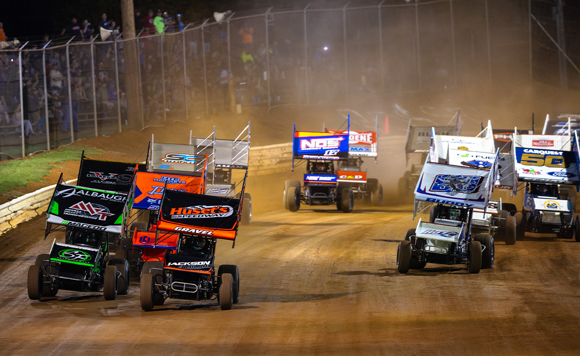 Sprint Cars race down the front straightaway at Lincoln Speedway