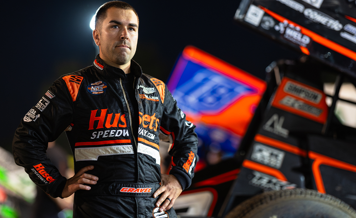 David Gravel standing in his fire suit