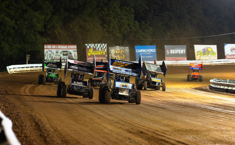 A pack of Sprint Cars races out of Turn 2 at Williams Grove Speedway
