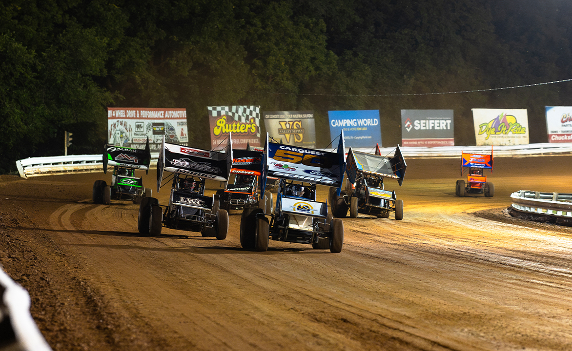 A pack of Sprint Cars races out of Turn 2 at Williams Grove Speedway